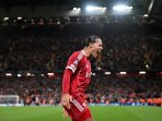 Virgil van Dijk (kiri) berselebrasi usai sundulannya di penghunjung pertandingan mengunci kemengangan Liverpool atas Atletico Madrid di Stadion Anfield, Kamis (18/9/2025) (Foto: Liverpool)